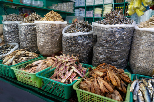 Traditional dried fish and seafood at a Philippine market stall