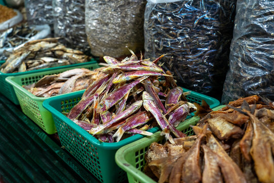 Traditional dried fish and seafood at a Philippine market stall