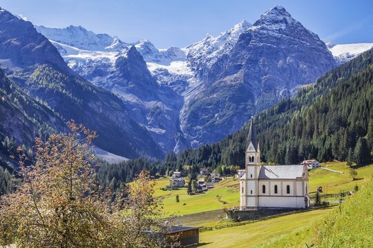 View of the village with the Church of the Visitation of the Virgin Mary and the Trafoier Ice Wall 3565m, Trafoi, Trafoital, Ortler Alps, Province of Bolzano, South Tyrol, Trentino-Alto Adige, Northern Italy, Italy