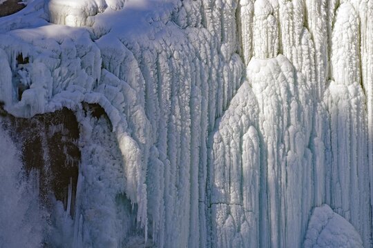 Ice formations at a frozen waterfall, fascinating structures and layers, winter, Sweden's highest waterfall, T&auml;nnforsen, &Aring;re&auml;lven, Are, J&auml;mtland, Sweden