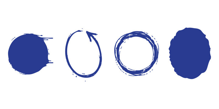 Set of four blue hand drawn circles and paint blotches with rough texture