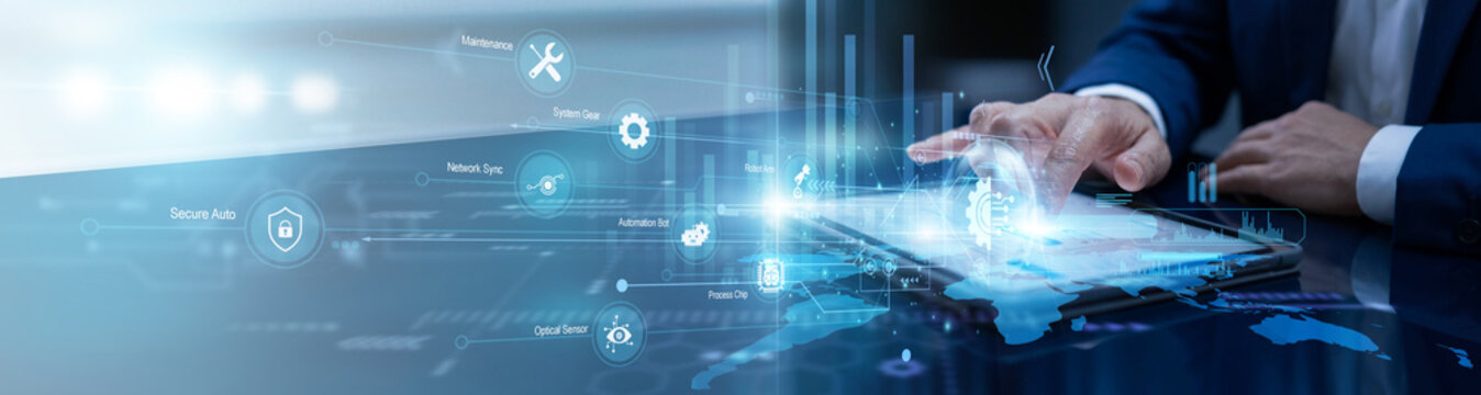 Factory manager touches the tablet to oversee industrial Automation, coordinating robotic workflows across global sites to maximize production efficiency and reduce manual labor.