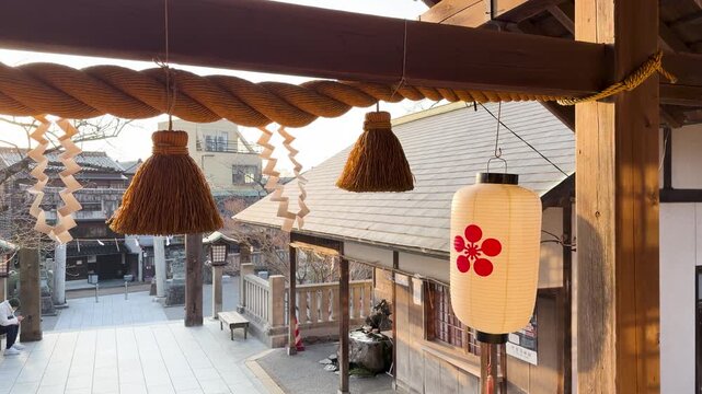 Traditional Japanese Shinto Shrine with Paper Lantern and Sacred Rope in Kanazawa