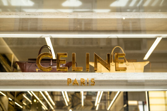 Celine Paris Storefront Window Display With Gold Logo and Designer Handbags Milan Italy May 14, 2026