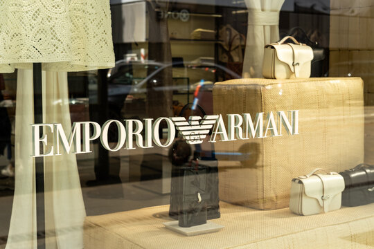 Emporio Armani Store Window Display With Luxury Handbags And Neutral Fashion Mannequins Milan Italy May 14, 202