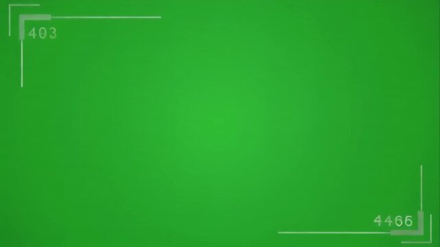 Camera on a tripod filming a green screen background for video production and editing