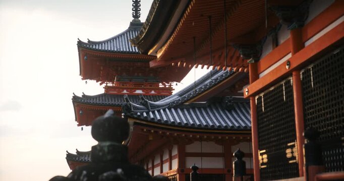 Rain dripping from roof of ancient Japanese temple in the morning