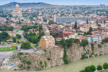 Metekhi Church stands on a rocky cliffside overlooking the river in Tbilisi © venemama