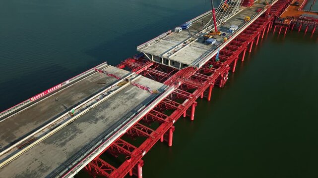 Bridge section removal in China using large cranes during dismantling project