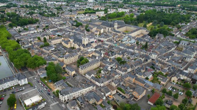  Aerial view beside the old town above the city La Fl&egrave;che in France, on a cloudy noon in early summer.