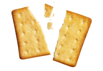 Fototapeta premium Cracked crispy biscuit split into parts with crumbs, isolated on cutout transparent background