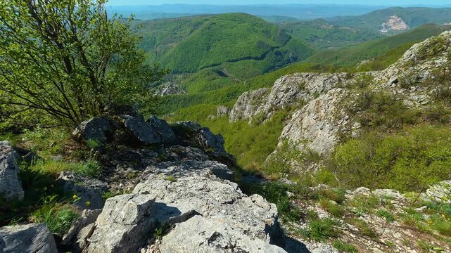 Sunlight glints off weathered stones. Ovcar Kablar Gorge. Balkans, Serbia