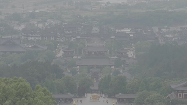 4K resolution tilting up high angle wide view of the ancient traditional Donglin Temple complex complex and courtyard in Jiujiang, shot in ProRes Log format