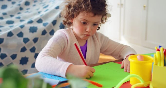 Home, kid and drawing with paper for learning, education and creative activity in living room. Art, writing and girl child with cognitive development, motor skills or imagination for growth and color