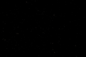 Particules beiges sur fond noir avec effet visuel de vitesse © Romain P19