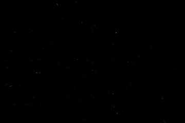 Particules beiges sur fond noir avec effet visuel de vitesse © Romain P19