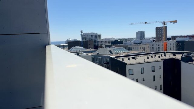Distant Sea Horizon over J&auml;tk&auml;saari Rooftops in Helsinki on a Sunny Summer Day