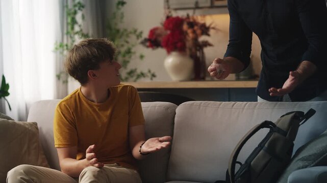Parents reprimanding adolescent son for smoking pot, warning about addiction
