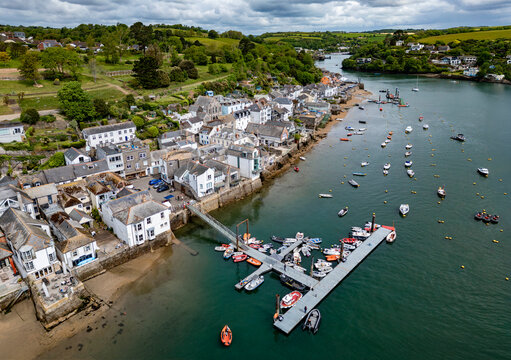 Aerial views of the seafront and estuary at Fowey on the south coast of Cornwall, England.
