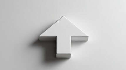 Fototapeta premium White Arrow Symbolizing Progress: A stark white arrow pointing upwards, casting a subtle shadow on a plain background, representing growth, direction, and advancement.