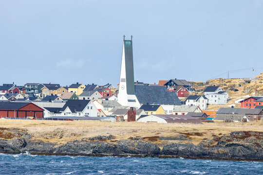 Part of Vard&oslash; seen from the coastal route on a beautiful spring day - Vardo Church