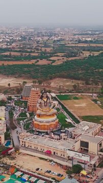 Aerial Drone Shot of Lord Shiva Statue at Char Dham Temple, Vrindavan, Mathura, India
