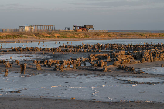 The ruins of the old mud baths on the Elton salt lake on a May evening. Volgograd region, Russia