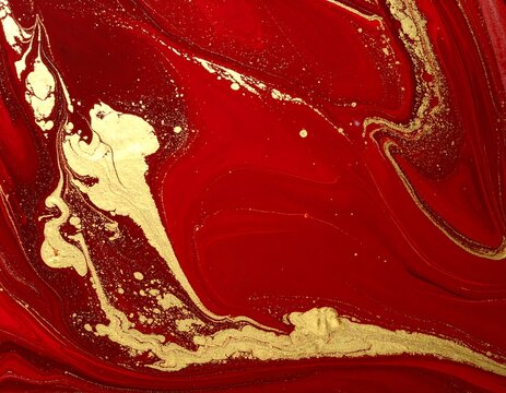 Luxurious Red and Gold Abstract Marbled Texture with Flowing Metallic Swirls
