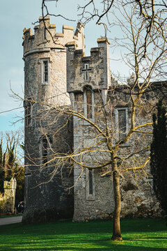 Historic stone tower and battlements of Clontarf Castle in Dublin, Ireland