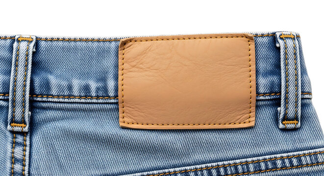 Close up of light blue denim jeans with brown leather patch