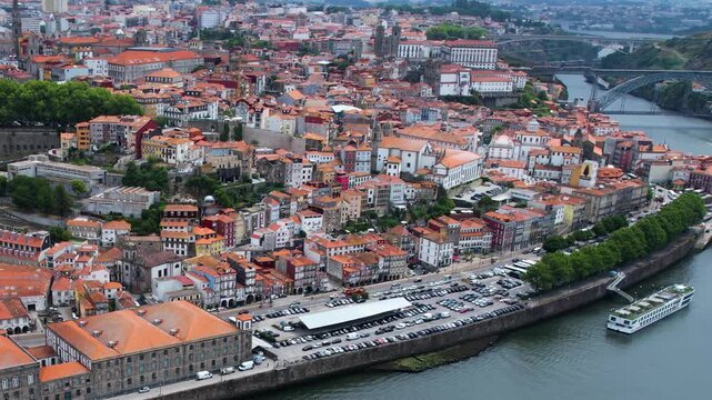 Aerial view of  the old town around the city Porto in Portugal beside the Douro River on  a sunny summer day.
