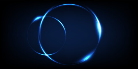Light circle background with blue light neon effect. Light glowing circle line of neon effect. Glowing blue ring trace. Glitter magic sparkle swirl trail effect on black background. © Novi