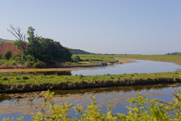 Obraz premium The Cuckmere River at Exceat in East Sussex, UK