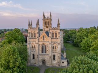 Selby Abbey in Selby, North Yorkshire, England, aerial view of the historic abbey, town centre rooftops, streets and medieval architecture. © Chris Chambers