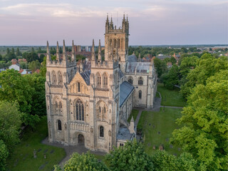Selby Abbey in Selby, North Yorkshire, England, aerial view of the historic abbey, town centre rooftops, streets and medieval architecture. © Chris Chambers