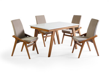 Fototapeta premium Modern wooden dining set with a rectangular white top table and four sleek beige upholstered chairs, isolated on a white background.