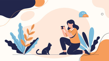Obraz premium Young woman kneeling down to take a photo of a small cat with her smartphone in a stylized natural environment.
