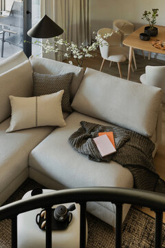Cozy Modern Living Room with Corner Sofa and Dining Area View: Stylish Interior Design for Comfortable Home Space