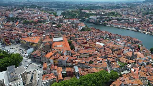 Aerial view beside the old town around the city Porto in Portugal beside the Douro River on  a sunny summer day.