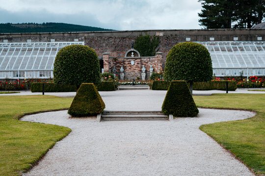 Beautiful symmetrical gravel pathway in the historic walled gardens of Powerscourt Estate, County Wicklow, Ireland