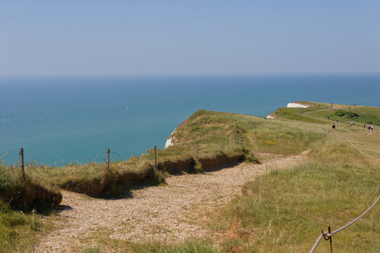 The coastal path between Beachy Head and Birling Gap in East Sussex, UK
