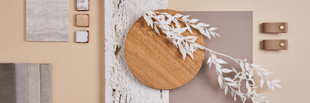 Creative flat lay composition with textile and paint samples, panels and cement tiles. Stylish interior designer moodboard. Light beige color palette. Copy space. Template.