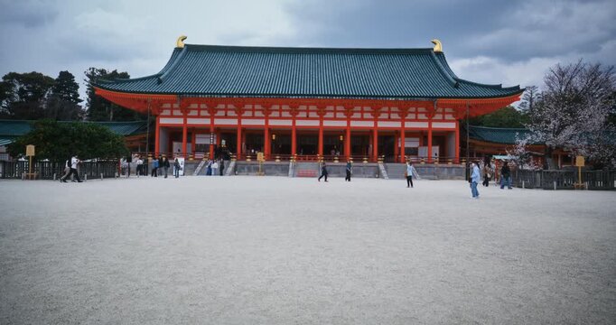 Old 19th century Daigokuden at Heisan shrine in Kyoto, Japan - steady cam forward
