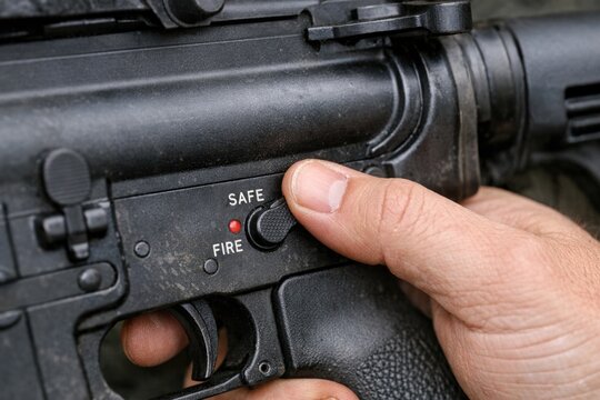 A person holding a flashlight with a red light on, suitable for crime or survival scenes