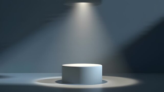 White cylinder podium under a bright spotlight in dark room