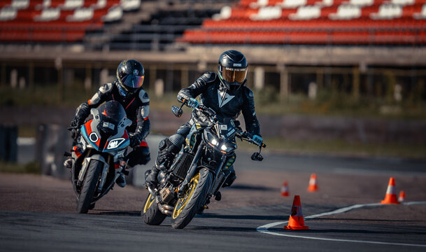 Regular training in Riga, Latvia,  Bikernieki on 12-05-2026  Two motorcyclists racing on a track, close call between competitors