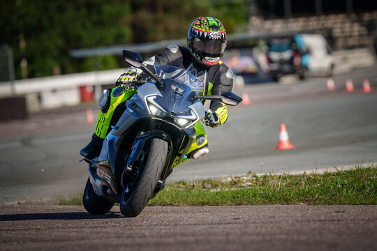 Regular training in Riga, Latvia,  Bikernieki on 12-05-2026  Motorcyclist executing a sharp turn on a racetrack