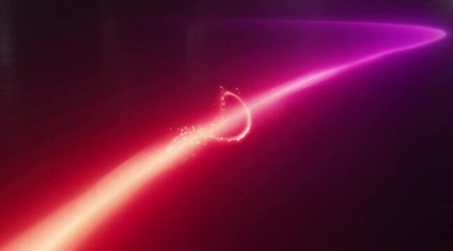 Vibrant light streak evolving with circular motion during a smooth camera pull back