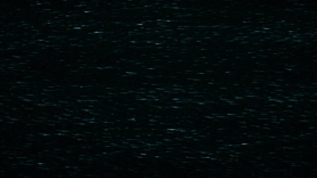 Vintage VHS TV Noise Glitch Loop Overlay Effect.