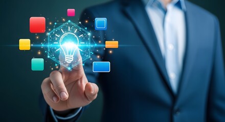 Fototapeta premium Businessman touching virtual light bulb with glowing blue network connections and colorful squares
